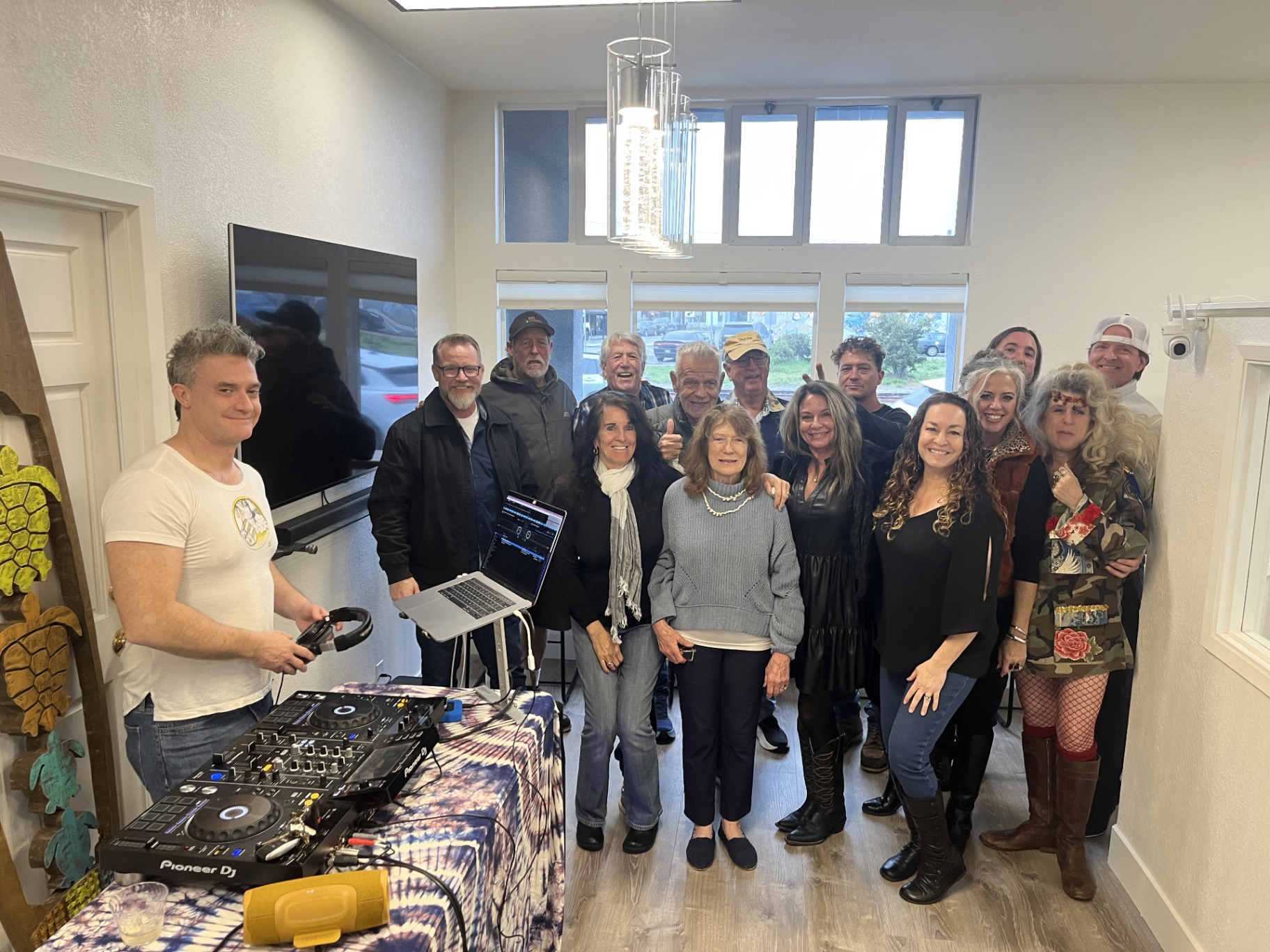 Epique Texas office — community gathering with DJ setup